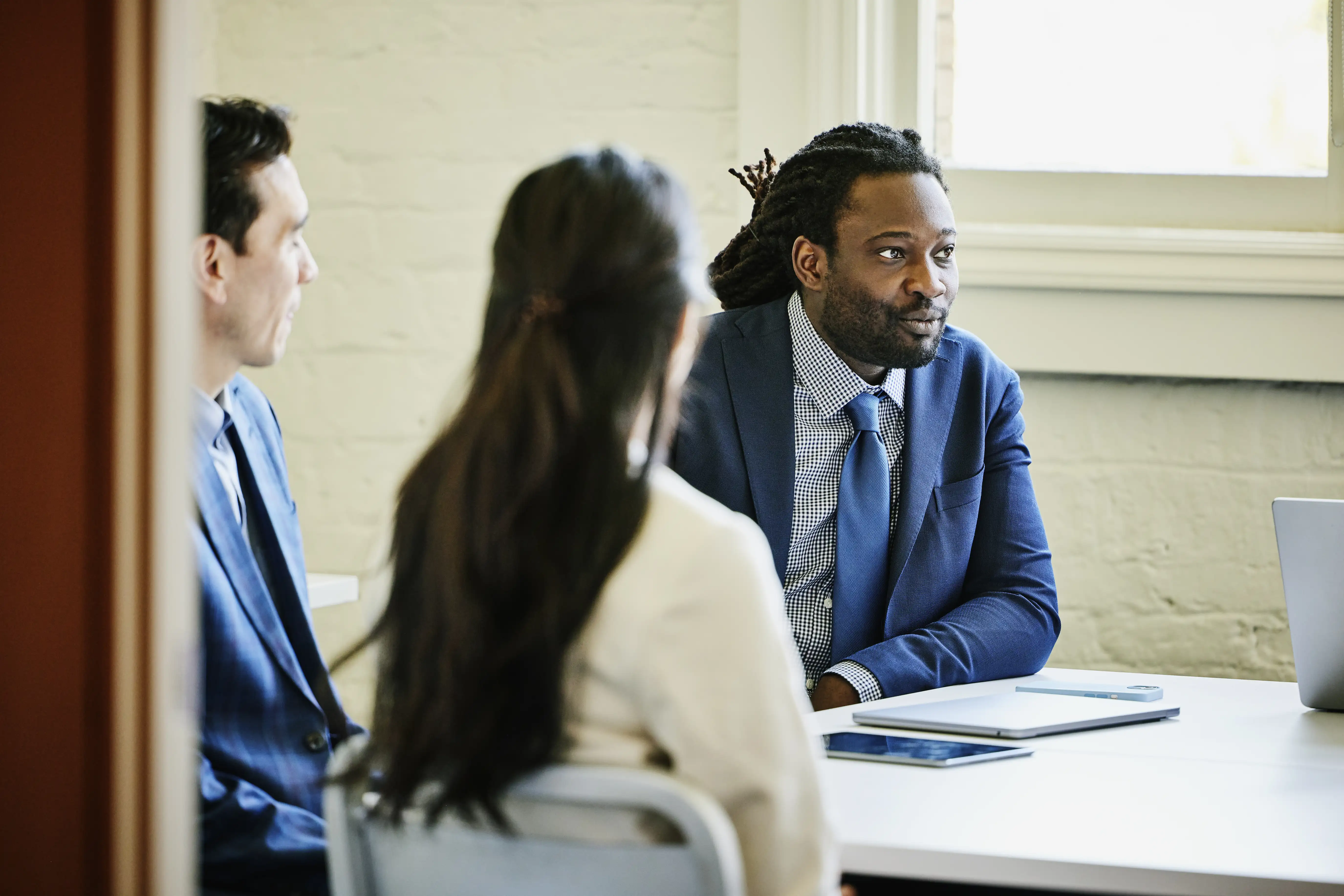 three people sat down