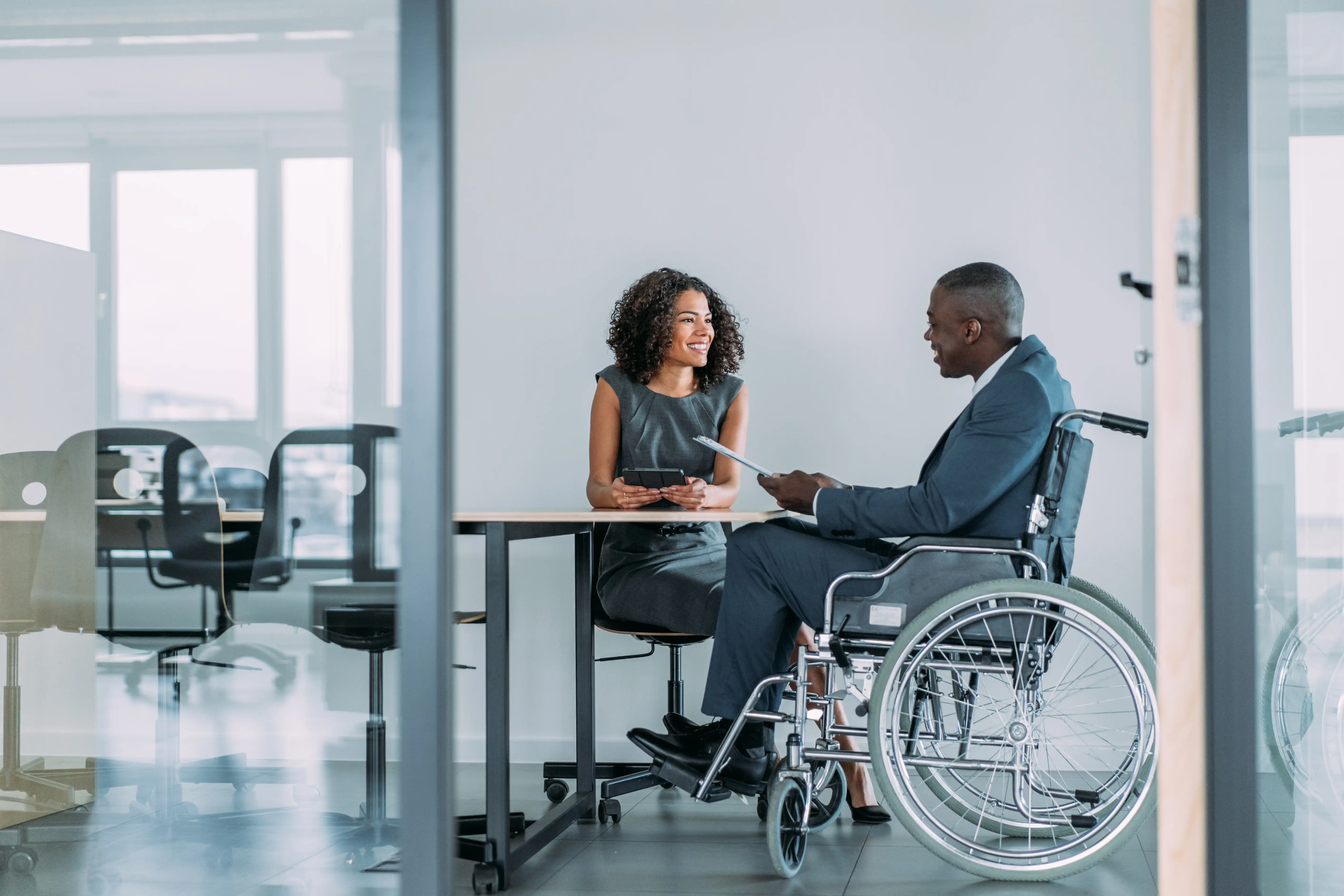 Two people in a meeting