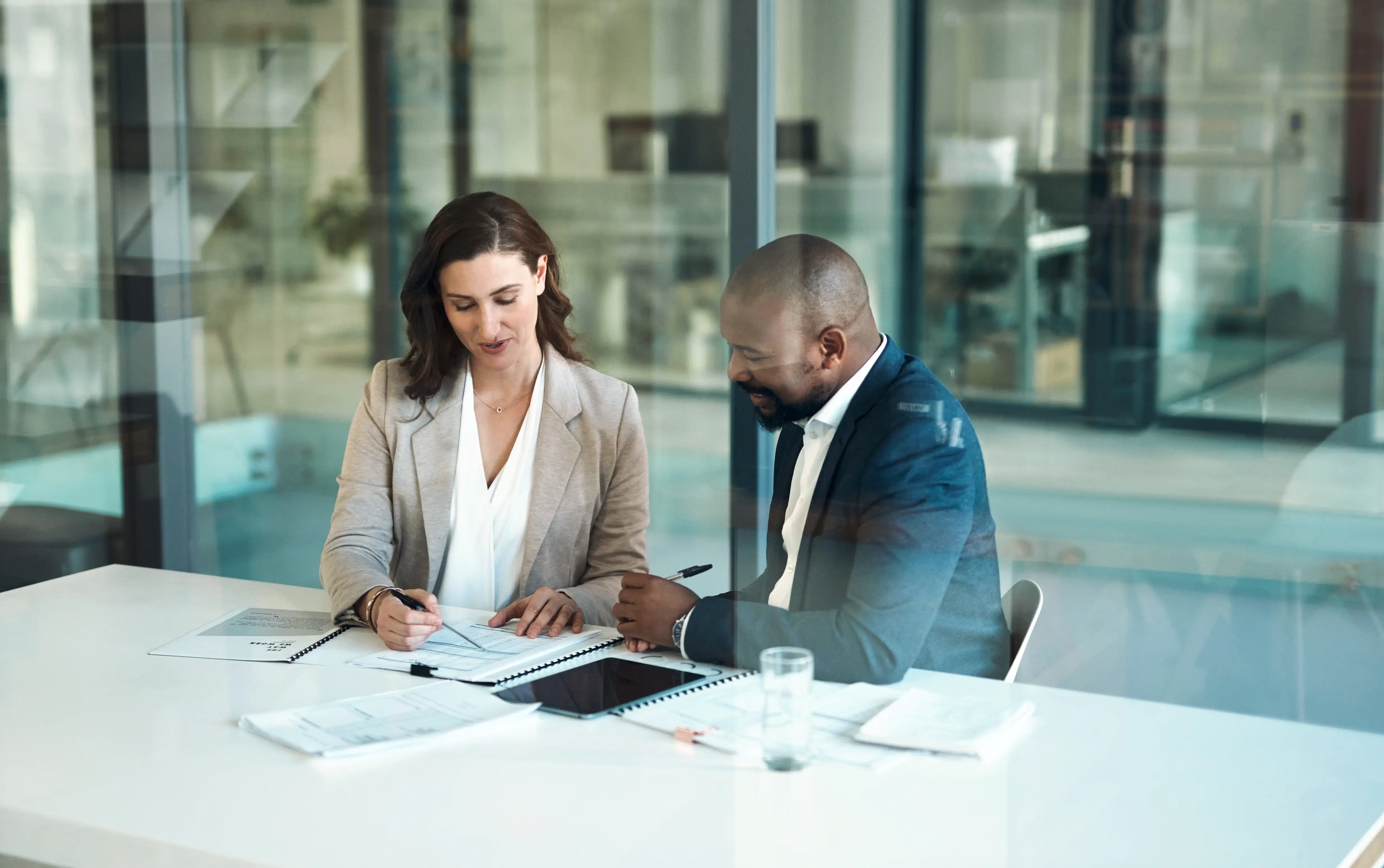 Two people working at a desk