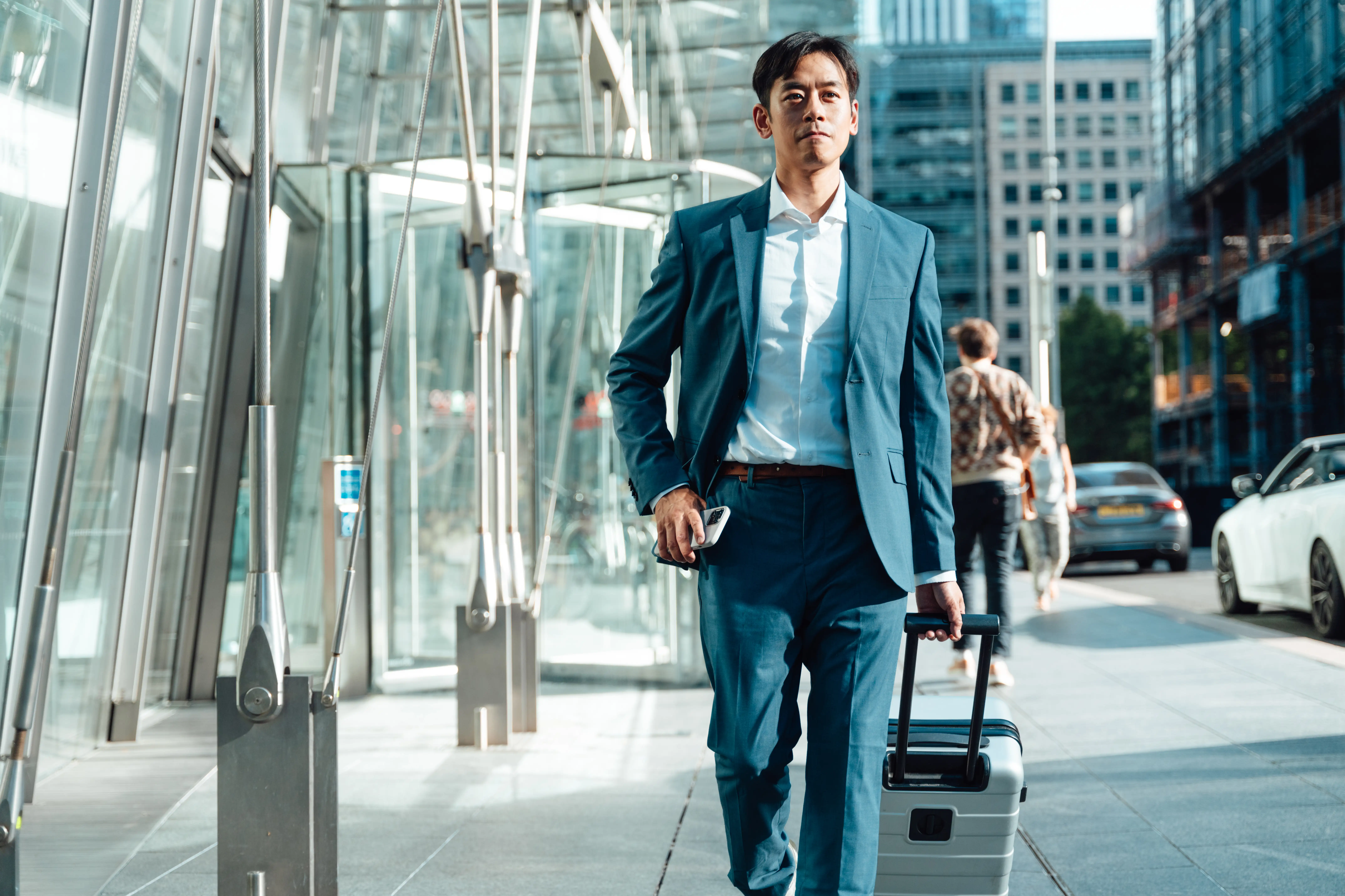 someone walking with a suitcase